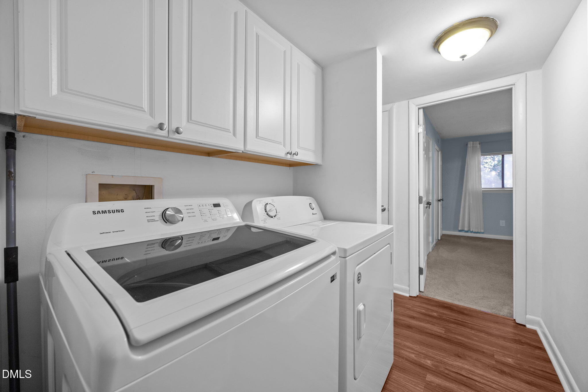 514 Pine Ridge Place Raleigh, NC 27609 - Photo 32 of 38 a utility room with sink dryer and washer