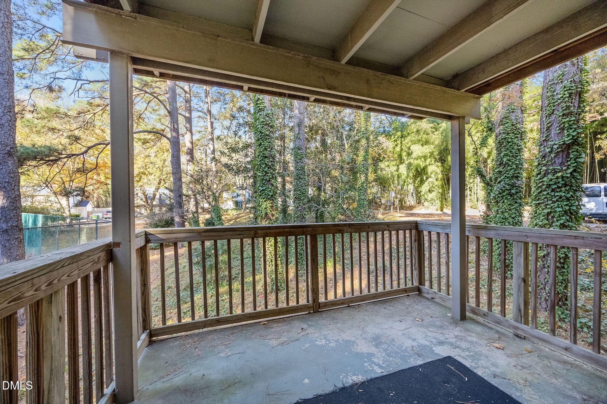 514 Pine Ridge Place Raleigh, NC 27609 - Photo 34 of 38 a view of a porch with wooden floor