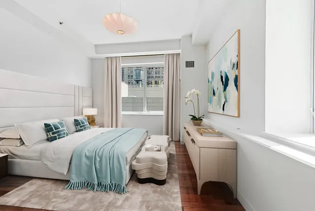 a kitchen with a stove and a refrigerator