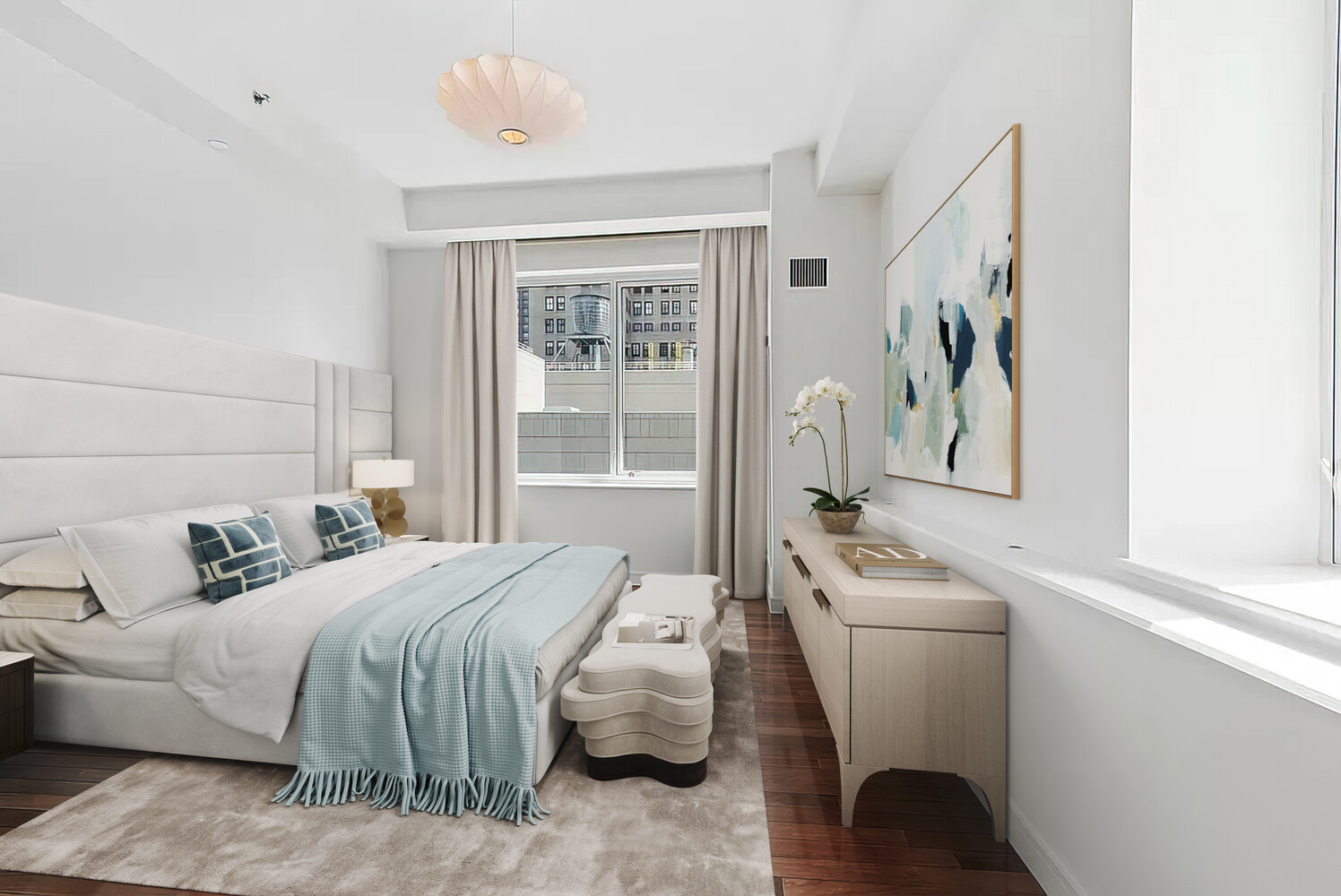 1 Irving Place, Unit 7B Manhattan, NY 10003 - Photo 3 of 8 a bedroom with a bed and a couch