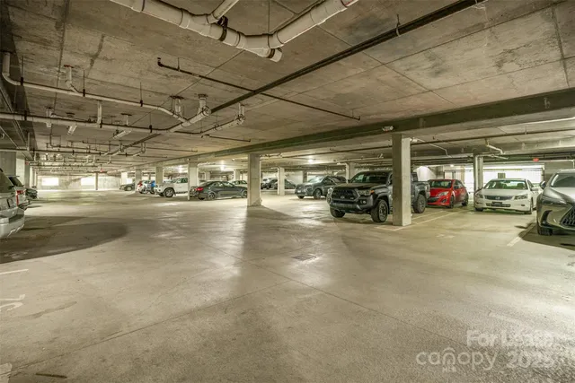 a view of a patio with a table and chairs