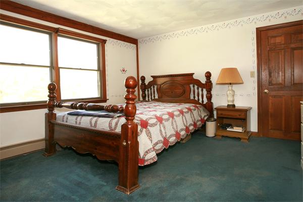 50 Depot Road Boxford, MA 01921 - Photo 16 of 23 a bedroom with a bed and a window