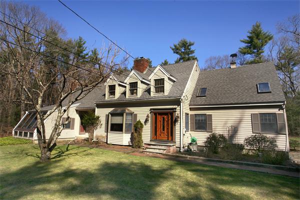 50 Depot Road Boxford, MA 01921 - Photo 3 of 23 front view of a house with a yard