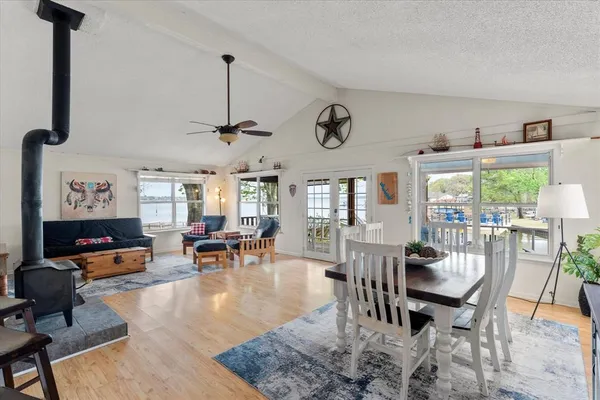 a view of a dining room with furniture window and outside view