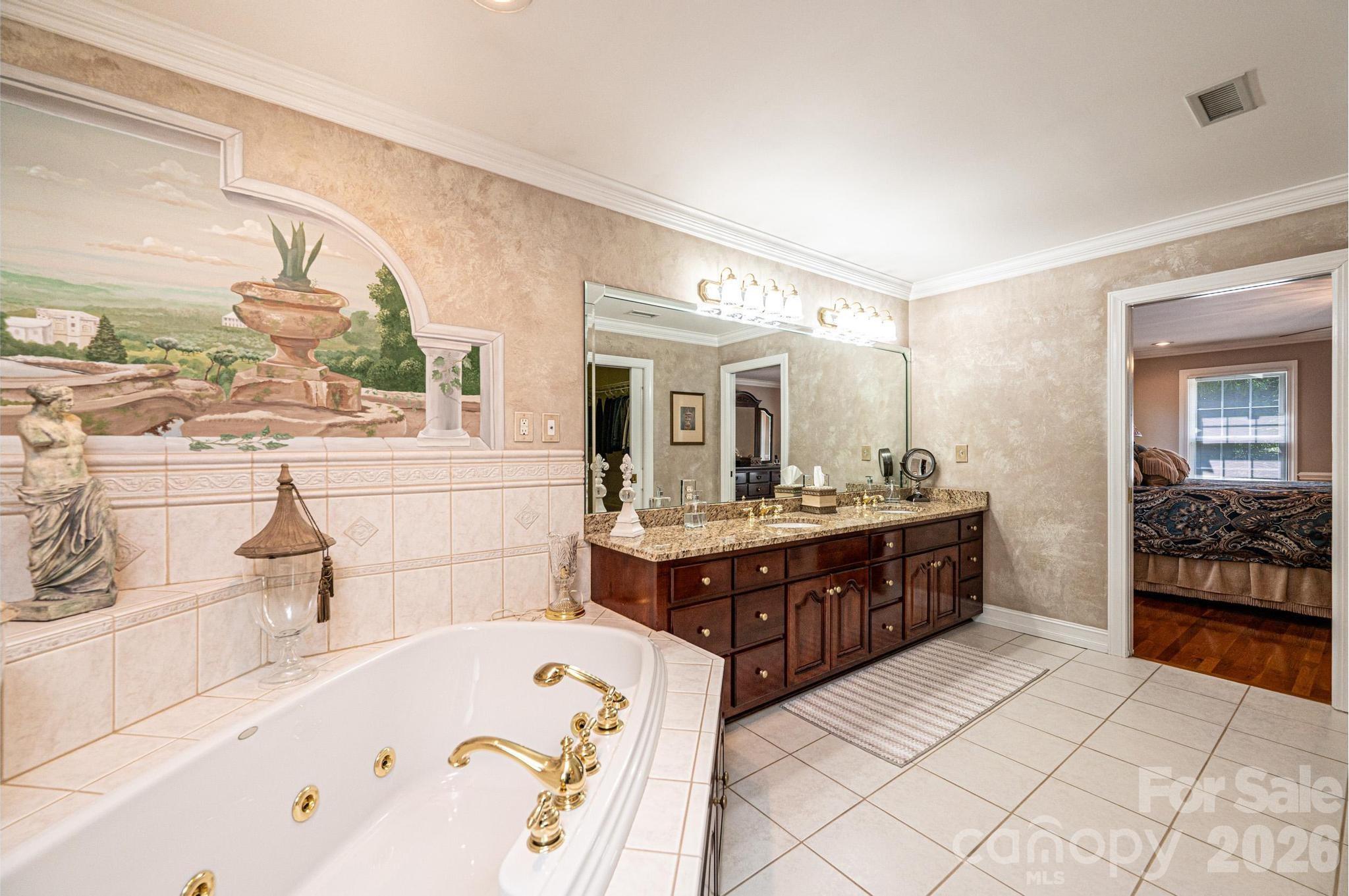 3788 Grace Chapel Road Granite Falls, NC 28630 - Photo 11 of 48 a spacious bathroom with a tub sink and mirror