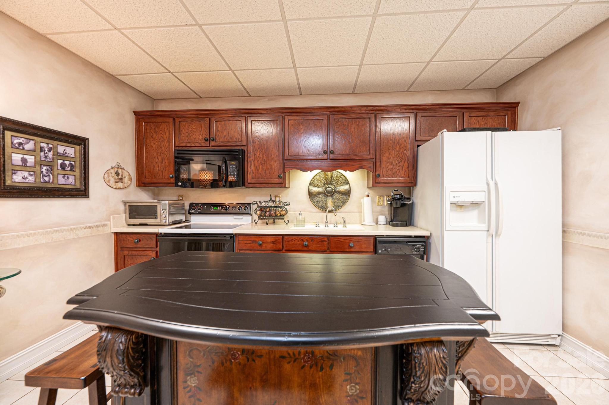 3788 Grace Chapel Road Granite Falls, NC 28630 - Photo 17 of 48 a room with refrigerator and outdoor