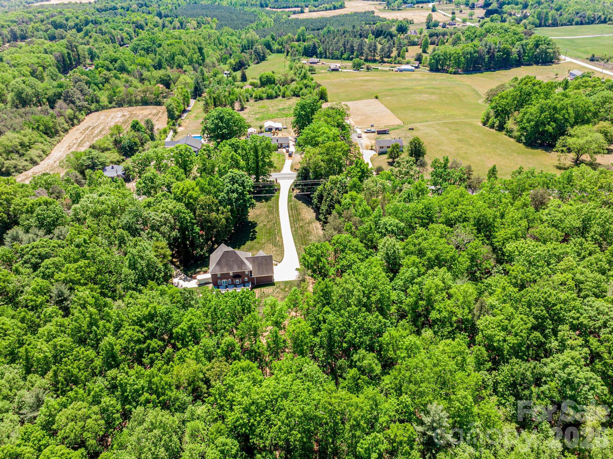 3788 Grace Chapel Road Granite Falls, NC 28630 - Photo 21 of 48 an aerial view of a house with yard and outdoor seating