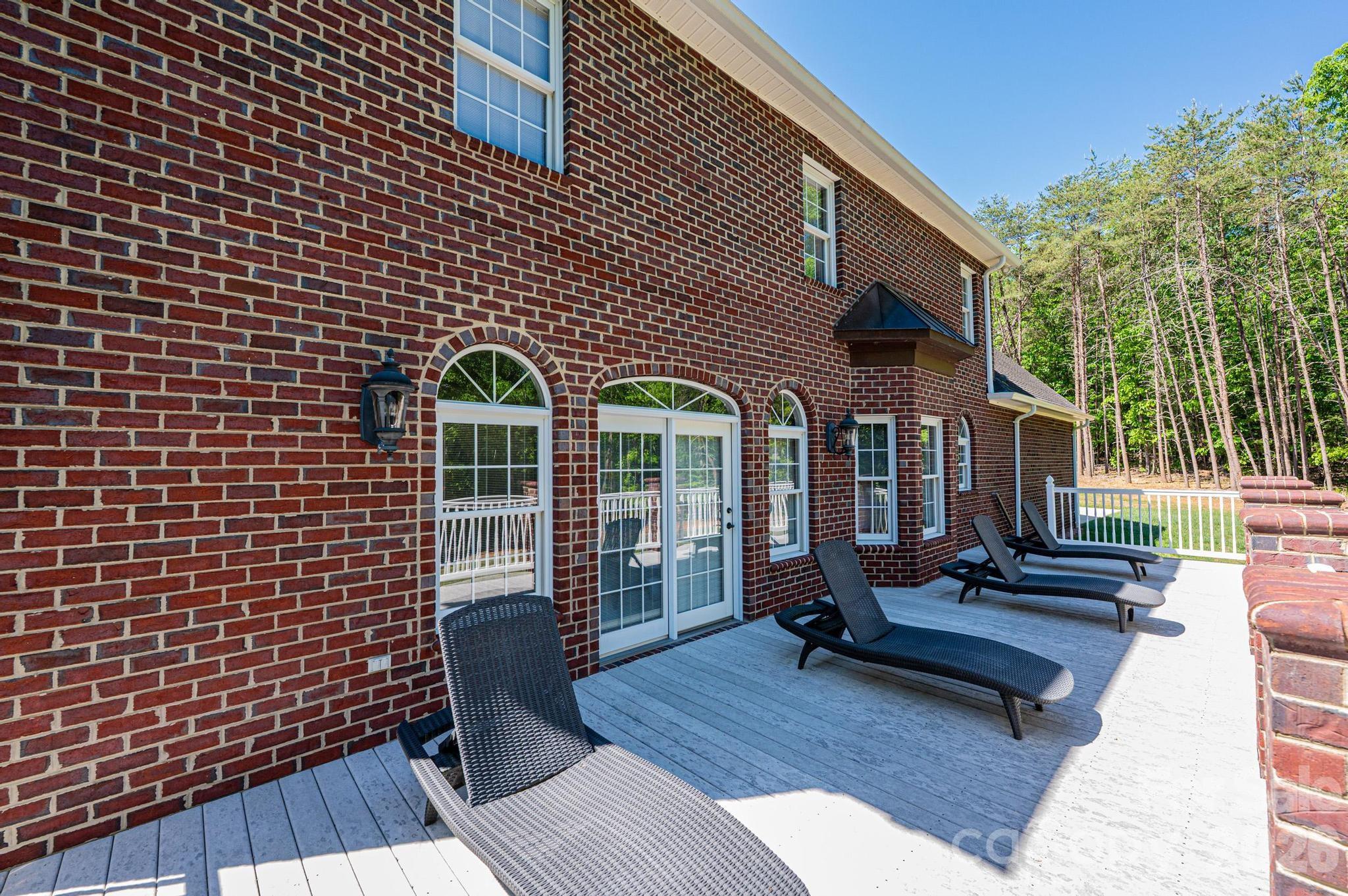 3788 Grace Chapel Road Granite Falls, NC 28630 - Photo 22 of 48 a view of a brick building with many windows