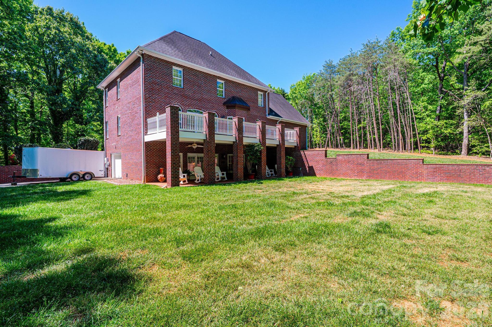3788 Grace Chapel Road Granite Falls, NC 28630 - Photo 27 of 48 a view of a house with a yard