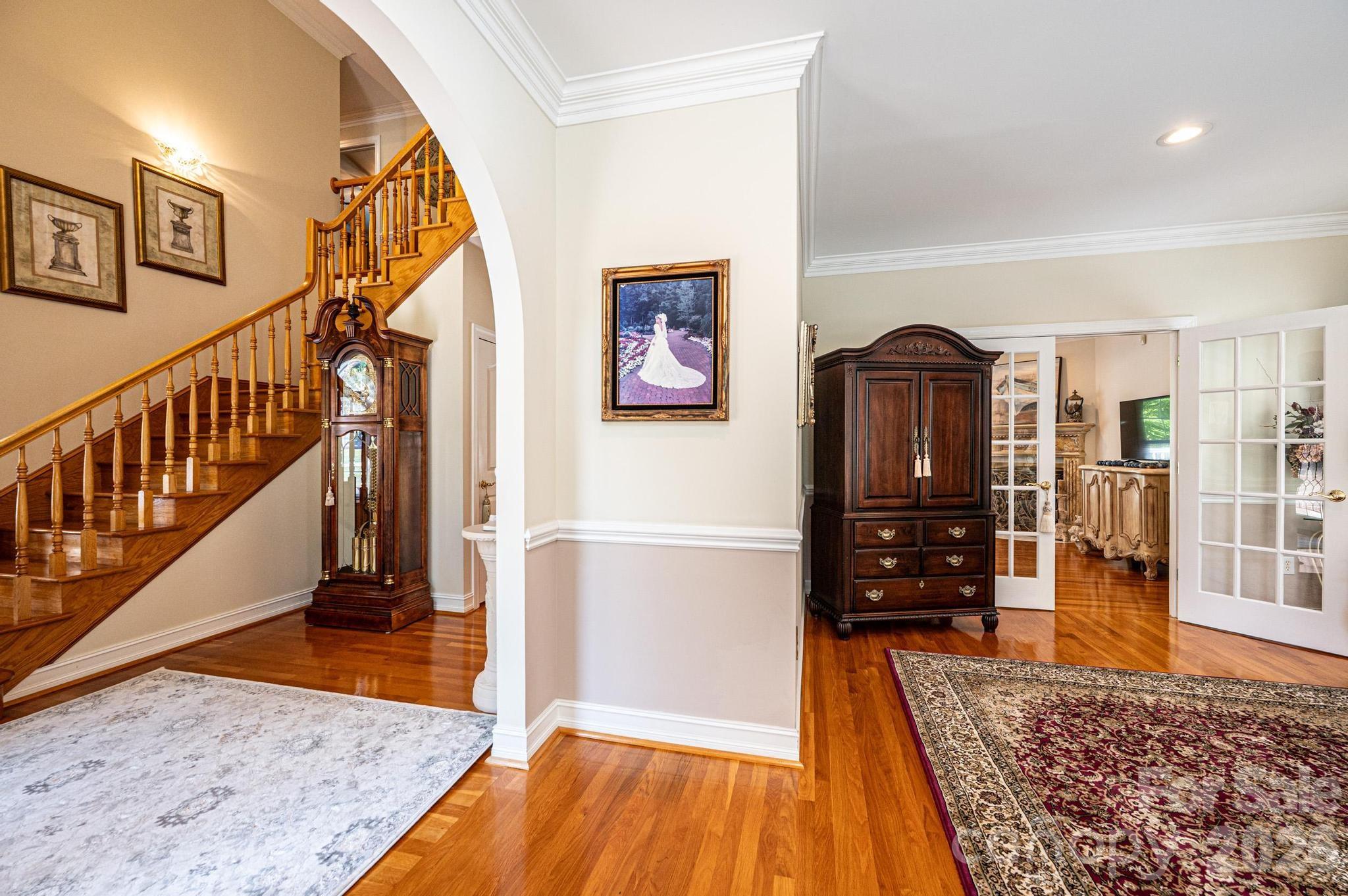 3788 Grace Chapel Road Granite Falls, NC 28630 - Photo 29 of 48 a view of a hallway with wooden floor and staircase