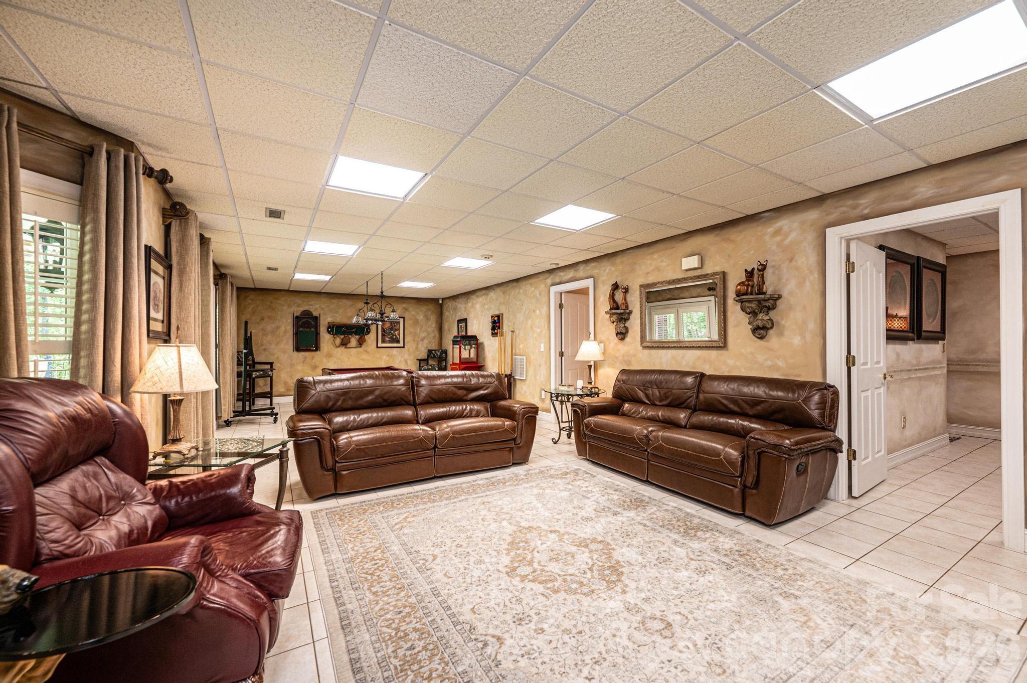 3788 Grace Chapel Road Granite Falls, NC 28630 - Photo 35 of 48 a living room with furniture and a window