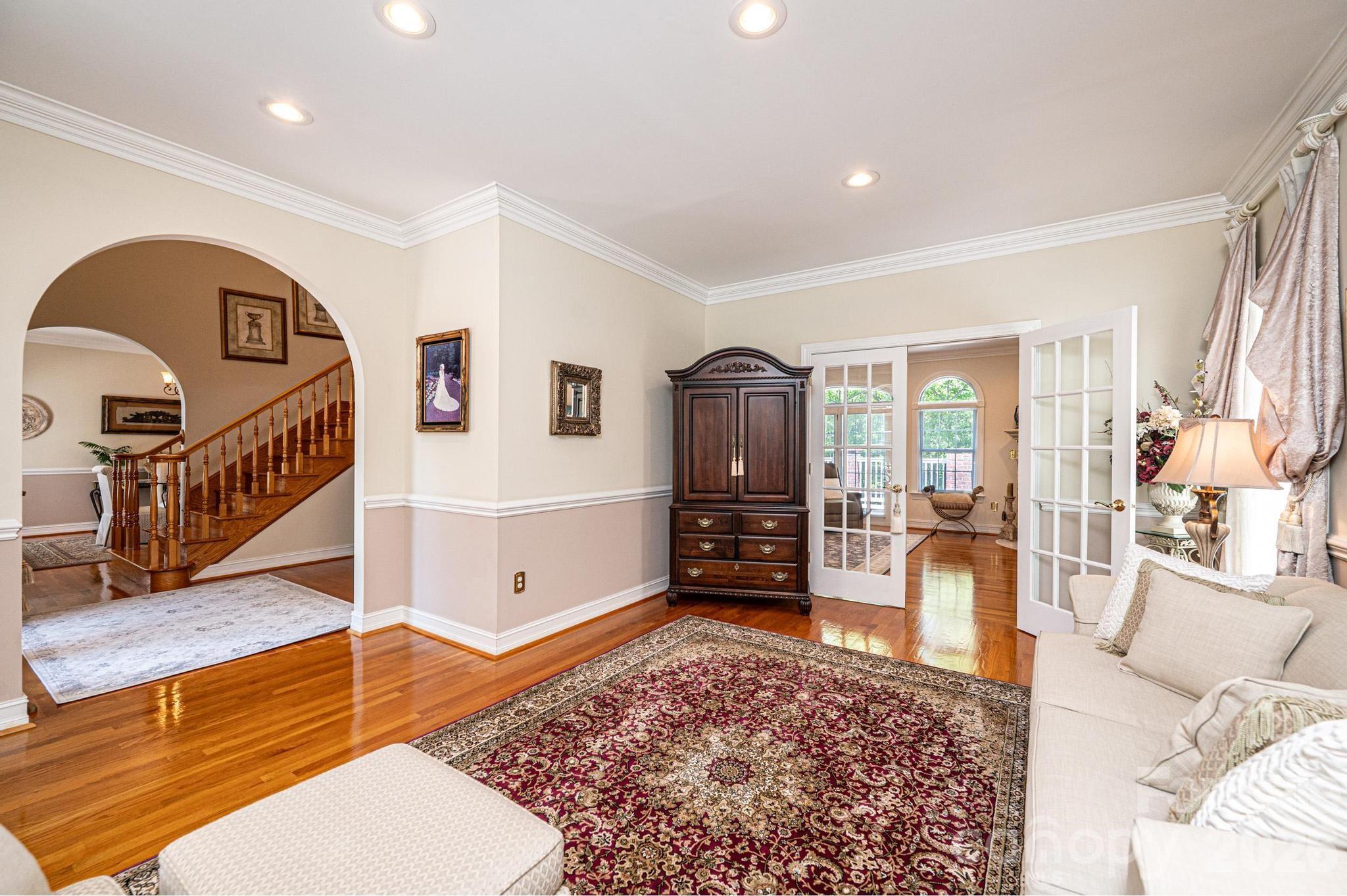 3788 Grace Chapel Road Granite Falls, NC 28630 - Photo 8 of 48 a living room with furniture windows and a rug