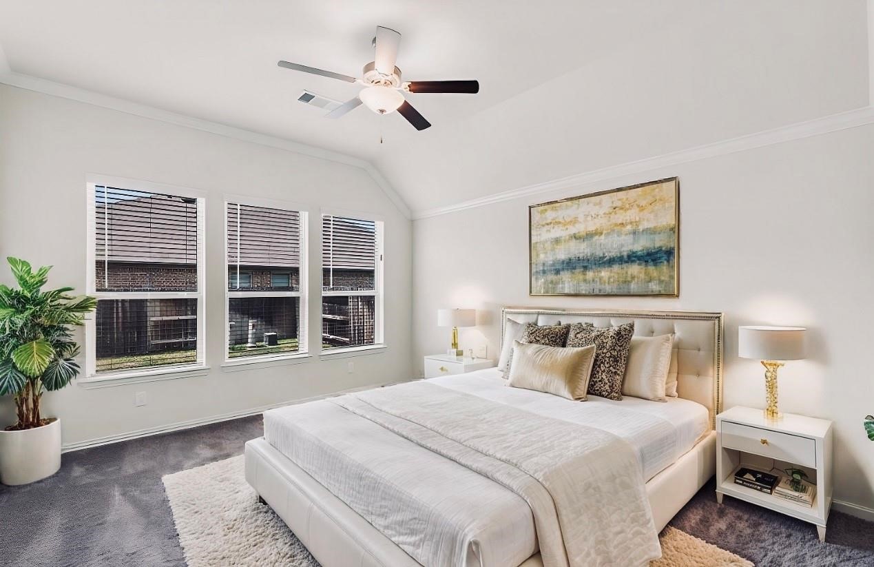 4420 Mimic Drive Spring, TX 77386 - Photo 12 of 40 a bedroom with a large bed and a window