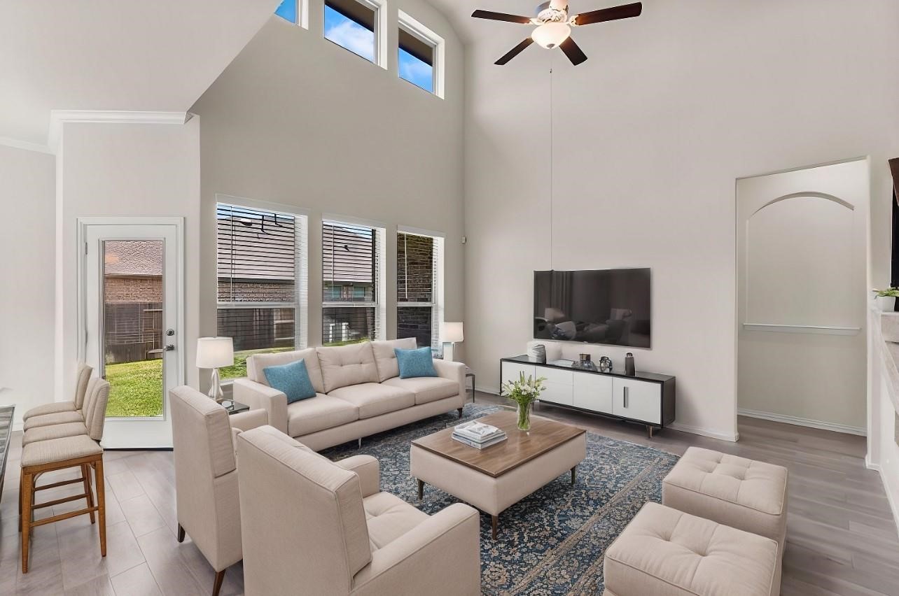 4420 Mimic Drive Spring, TX 77386 - Photo 6 of 40 a living room with furniture and a flat screen tv