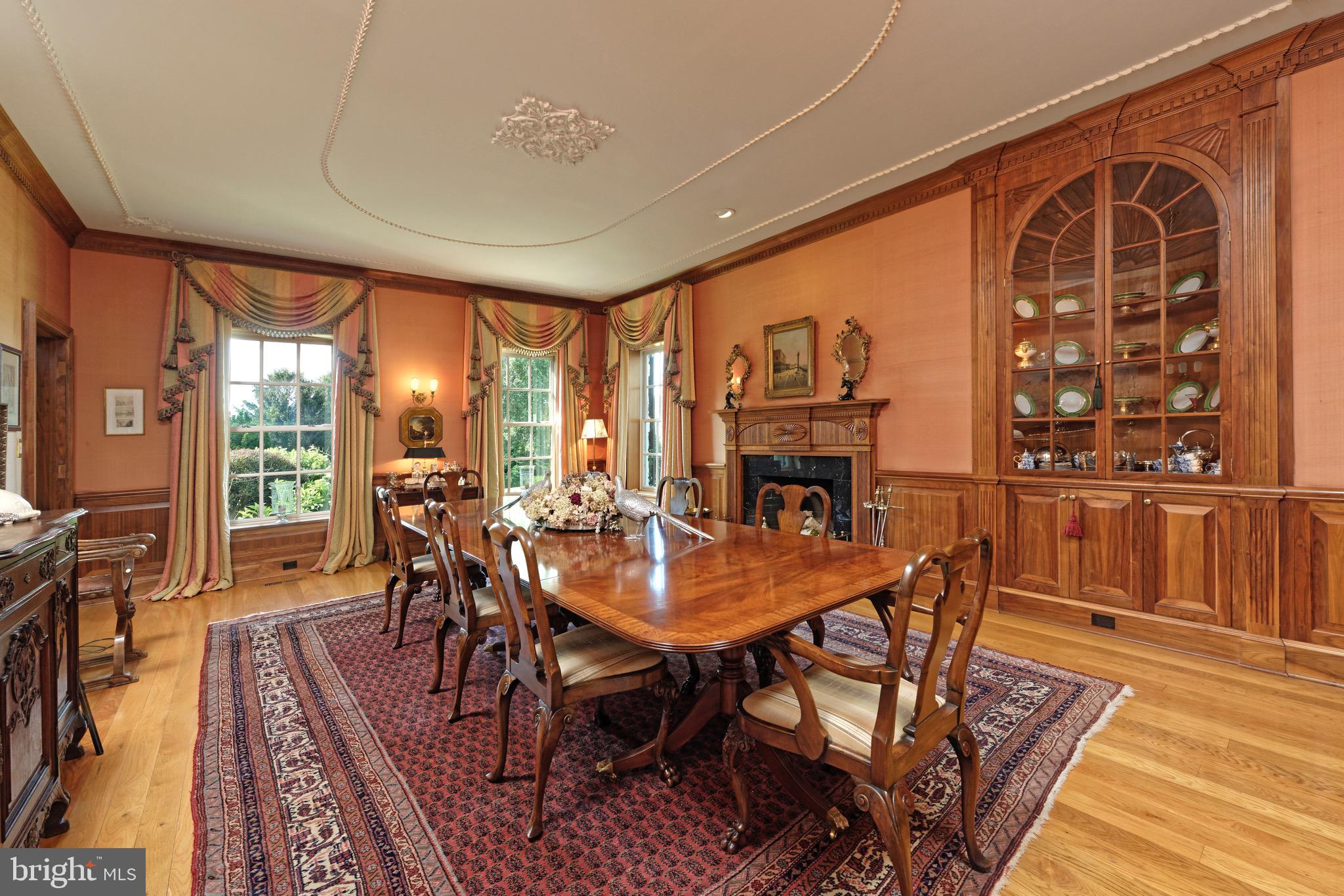 574 Clay Hill Road Boyce, VA 22620 - Photo 13 of 44 a view of a dining room with furniture window and wooden floor