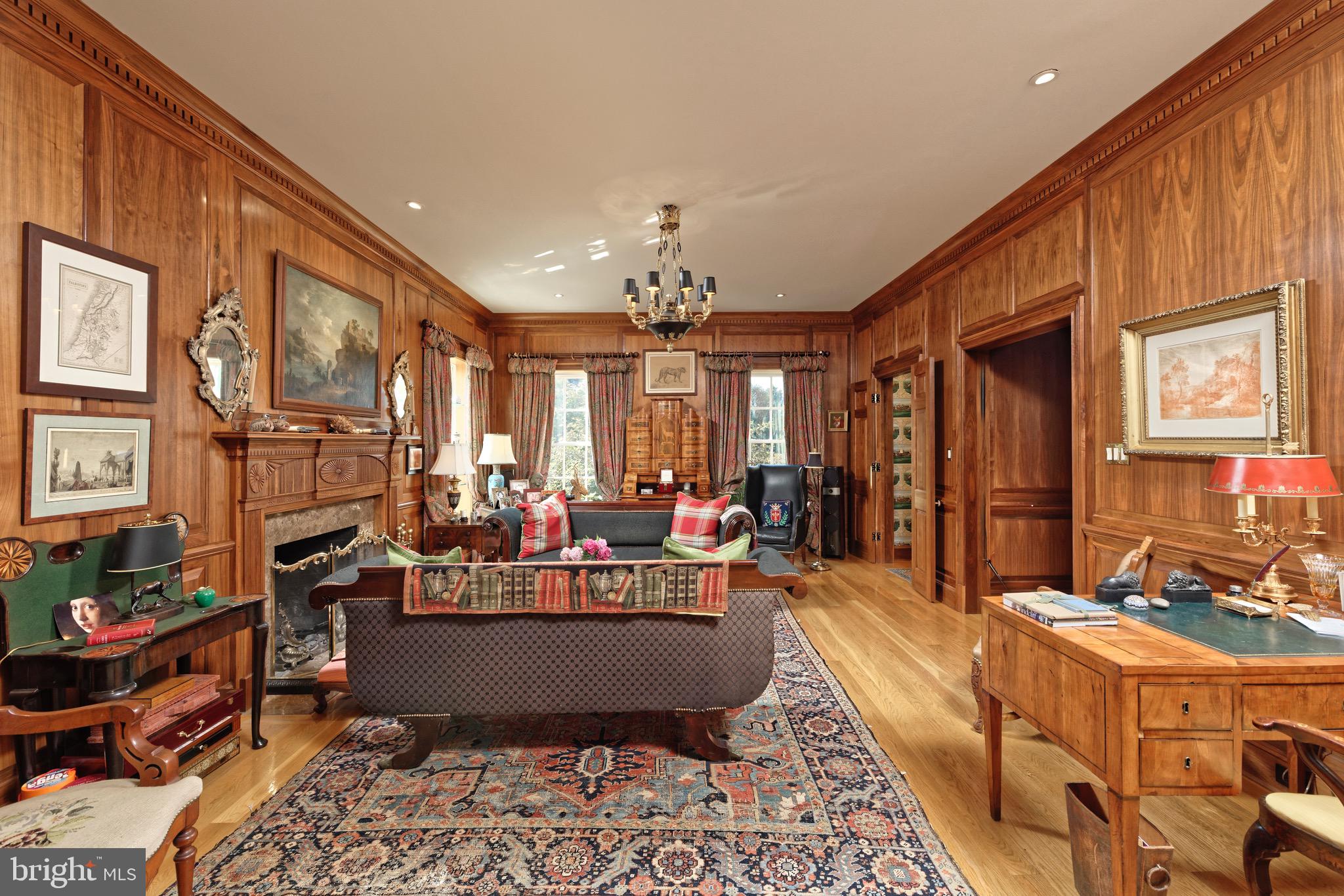 574 Clay Hill Road Boyce, VA 22620 - Photo 15 of 44 a living room with fireplace furniture and a chandelier