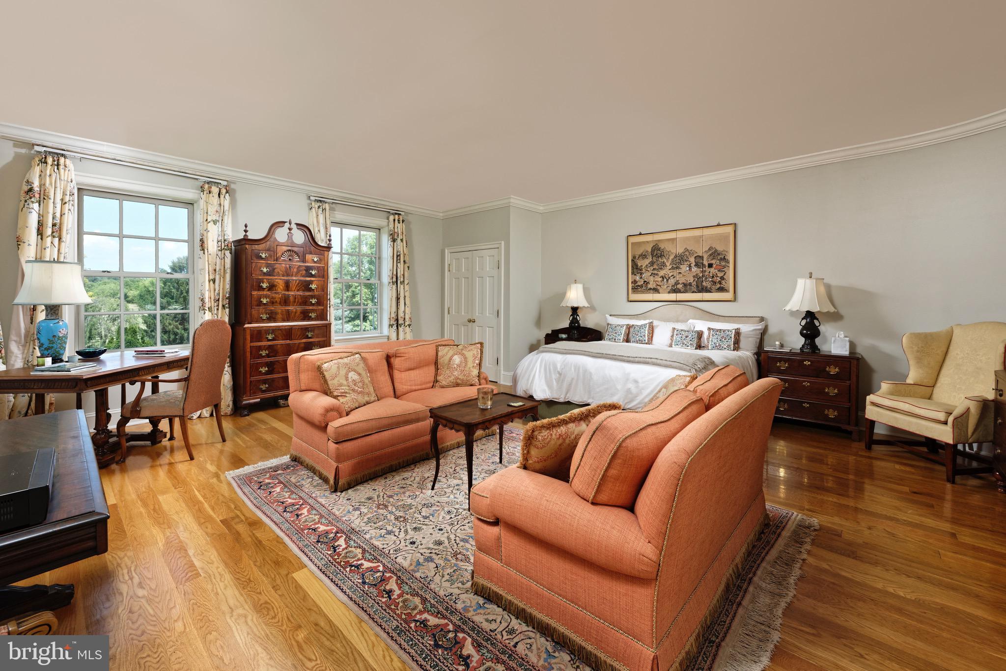 574 Clay Hill Road Boyce, VA 22620 - Photo 21 of 44 a living room with furniture and a flat screen tv
