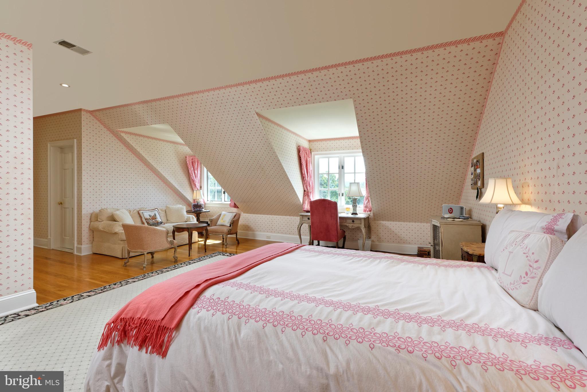 574 Clay Hill Road Boyce, VA 22620 - Photo 25 of 44 a bedroom with a bed and a large mirror