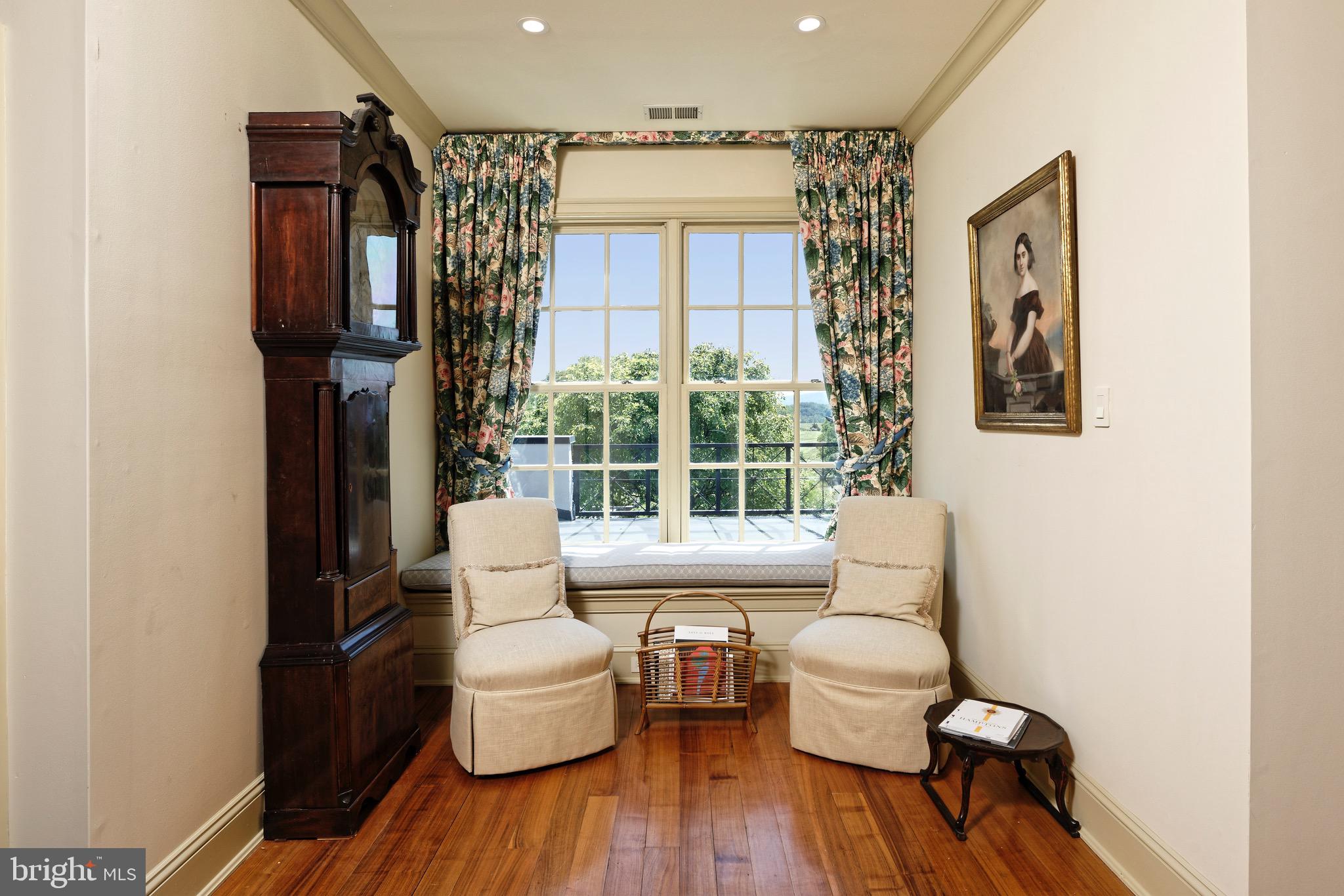 574 Clay Hill Road Boyce, VA 22620 - Photo 27 of 44 a living room with furniture and a window