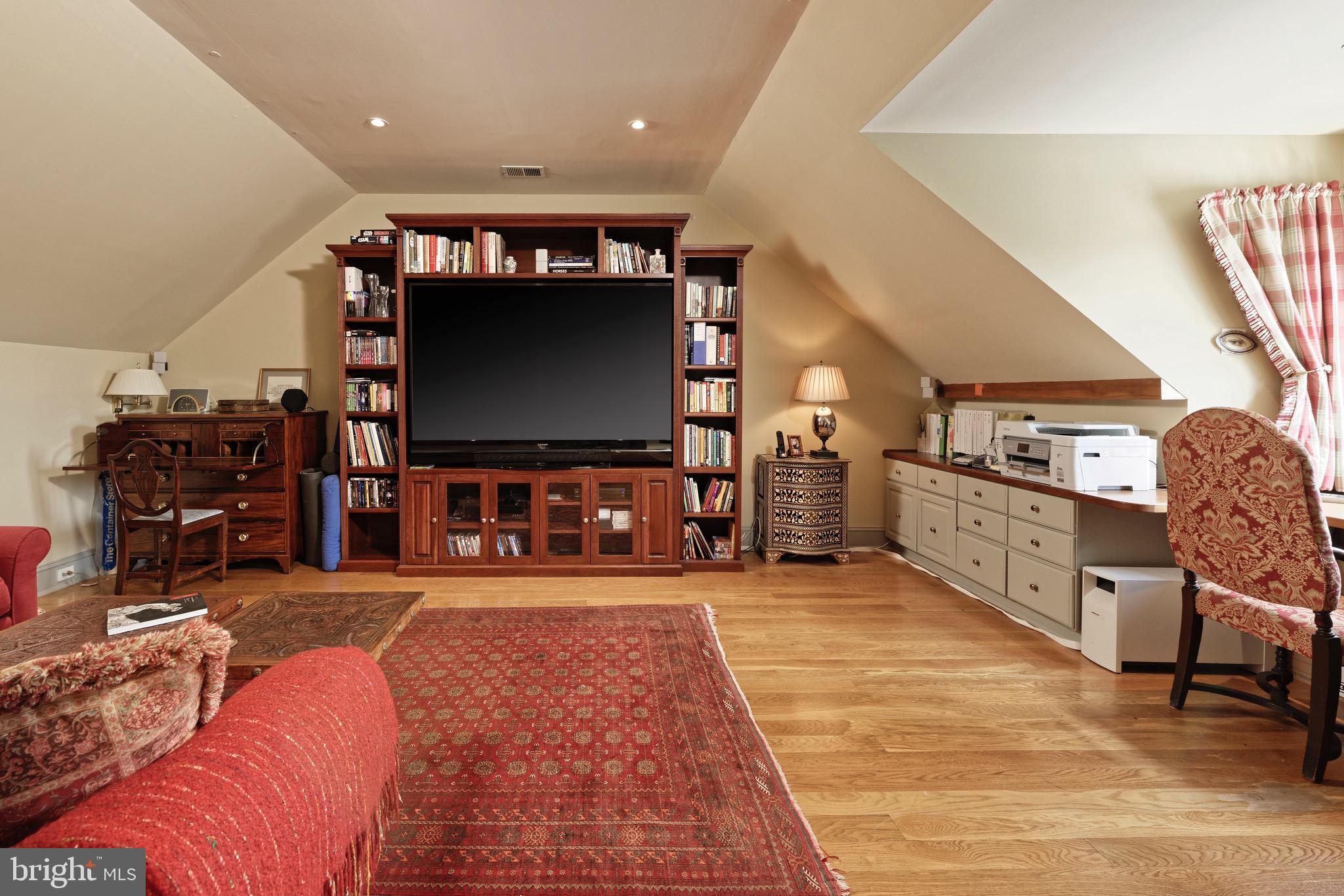 574 Clay Hill Road Boyce, VA 22620 - Photo 28 of 44 a living room with furniture and a flat screen tv