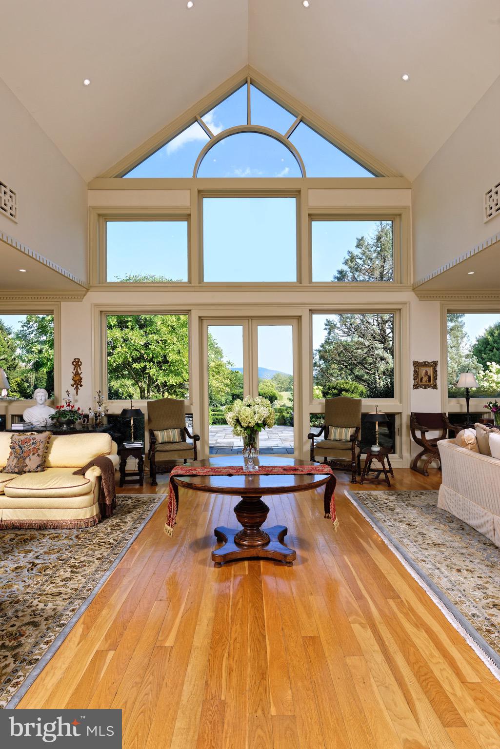574 Clay Hill Road Boyce, VA 22620 - Photo 4 of 44 a living room with furniture and a large window