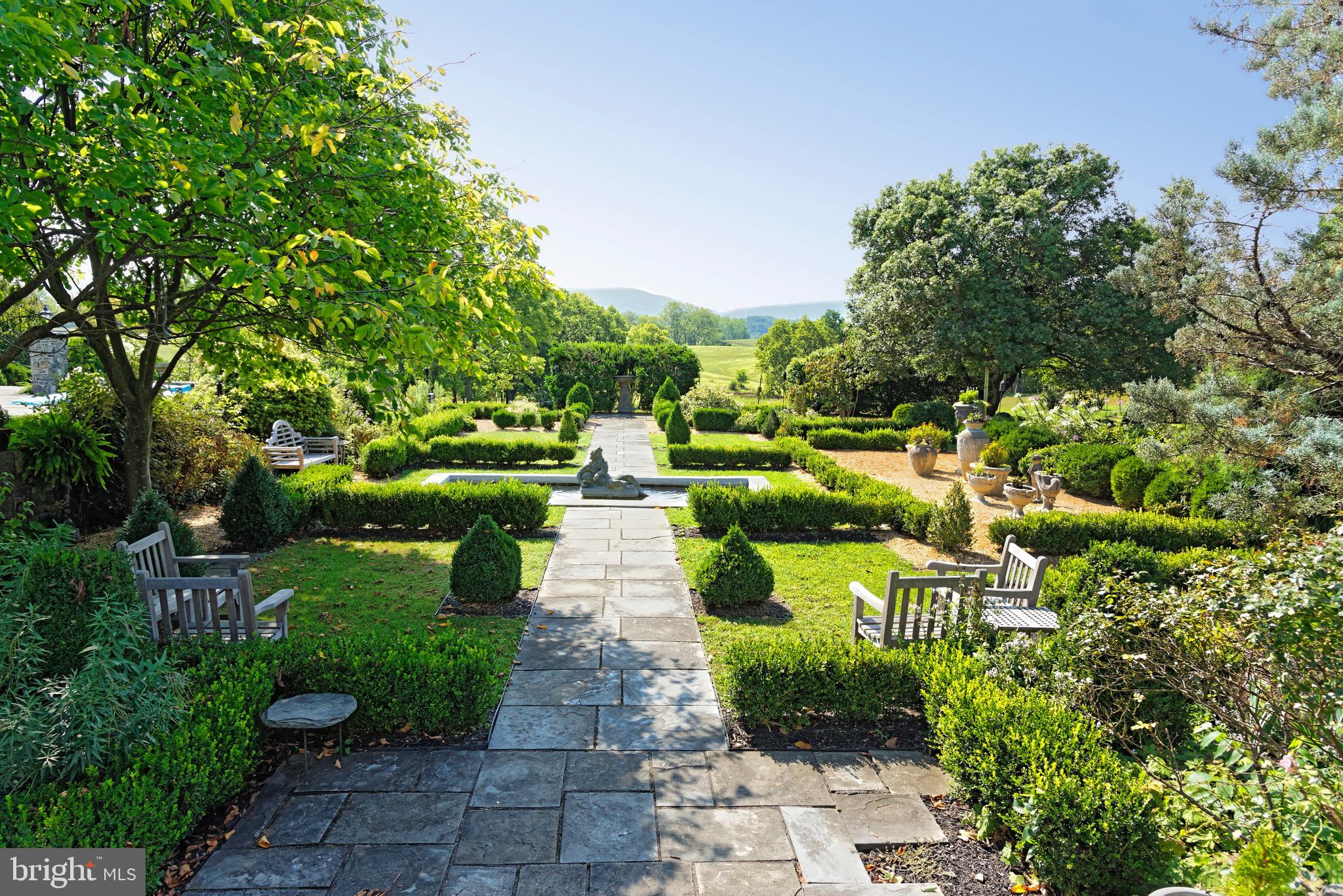 574 Clay Hill Road Boyce, VA 22620 - Photo 33 of 44 a view of a garden with lawn chairs
