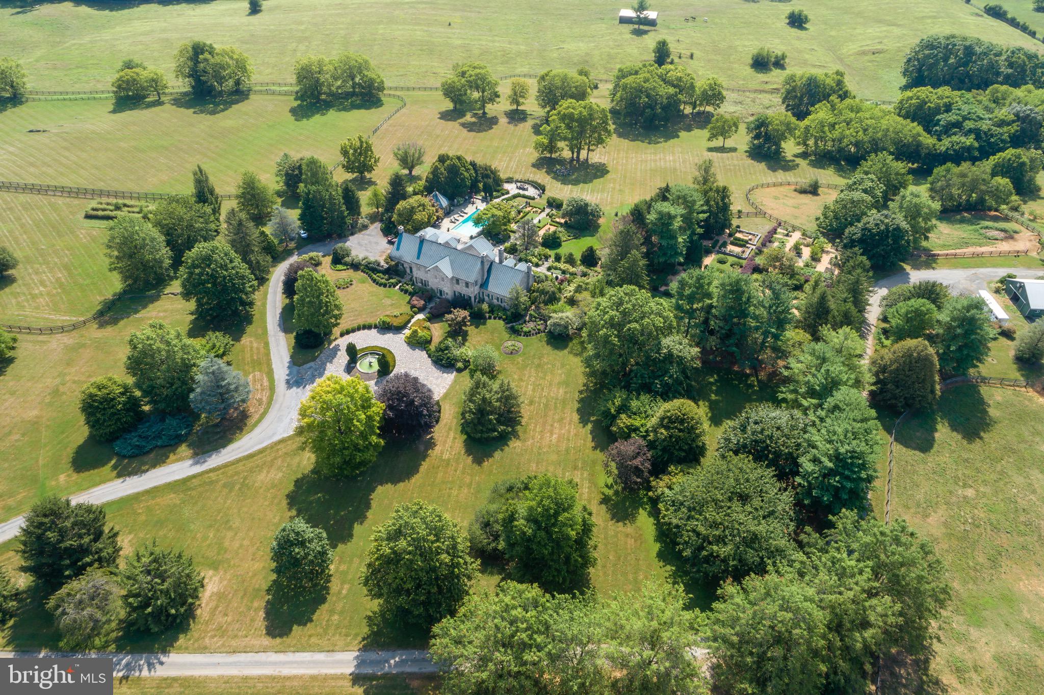 574 Clay Hill Road Boyce, VA 22620 - Photo 38 of 44 an aerial view of residential houses with outdoor space and trees all around
