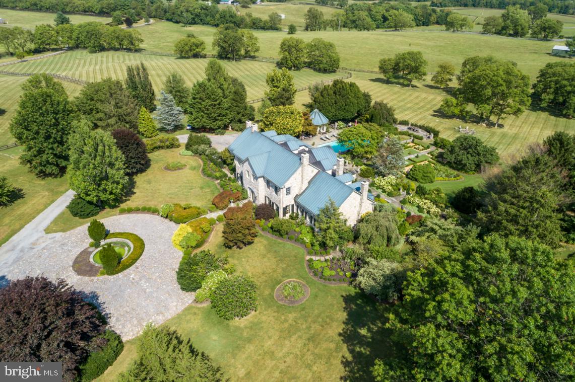 574 Clay Hill Road Boyce, VA 22620 - Photo 43 of 44 a aerial view of residential house with outdoor space and trees all around
