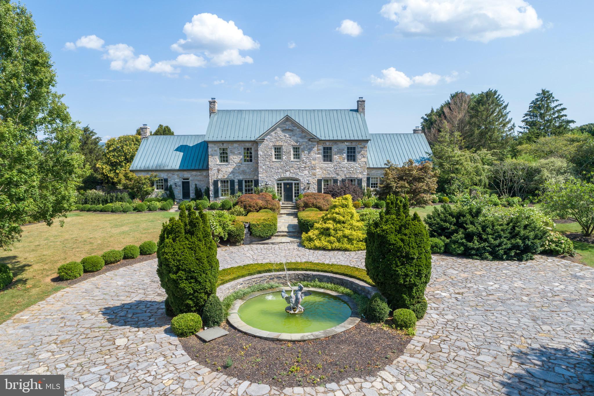 574 Clay Hill Road Boyce, VA 22620 - Photo 44 of 44 a view of a house with backyard outdoor seating and lake