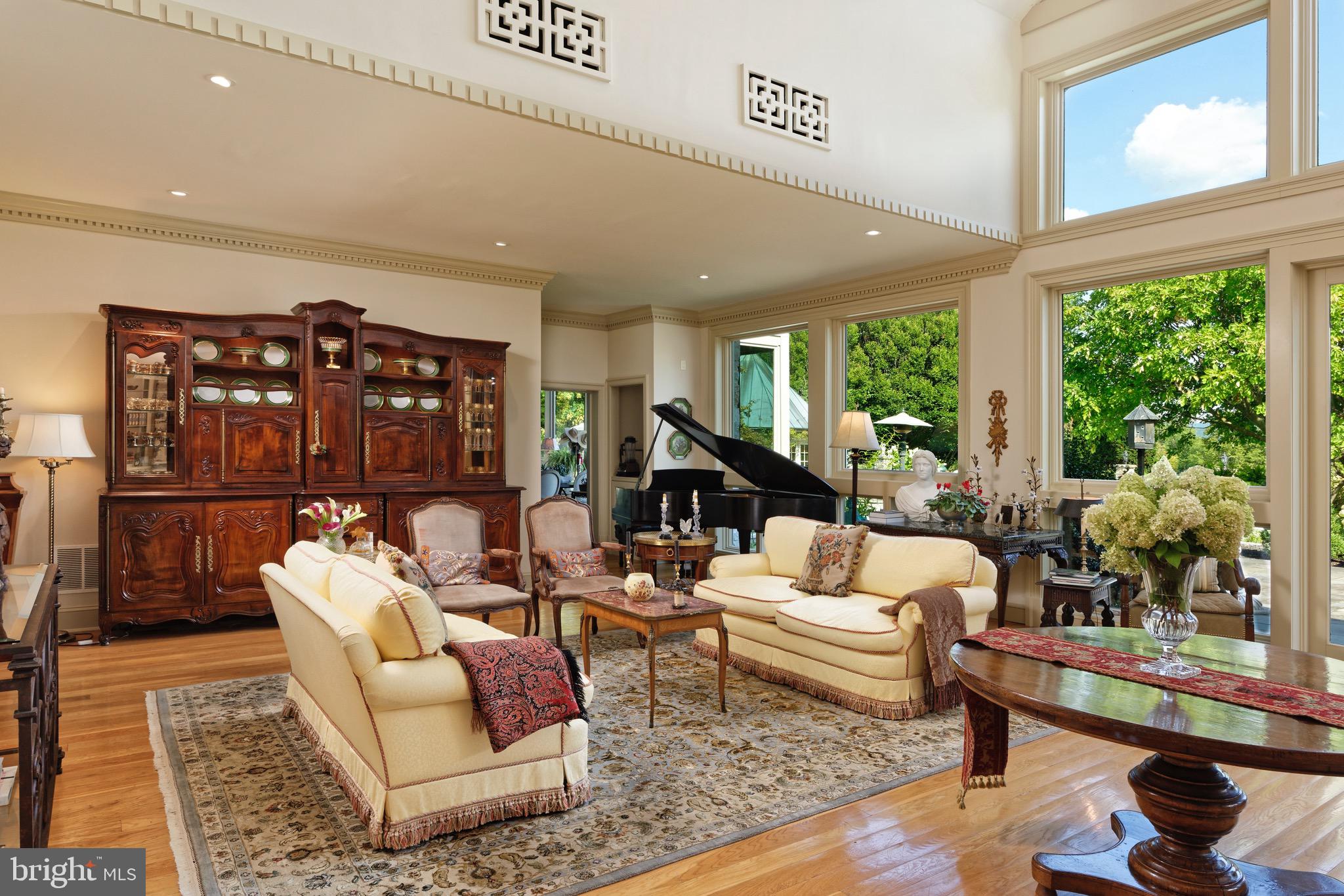 574 Clay Hill Road Boyce, VA 22620 - Photo 7 of 44 a living room with furniture and a floor to ceiling window