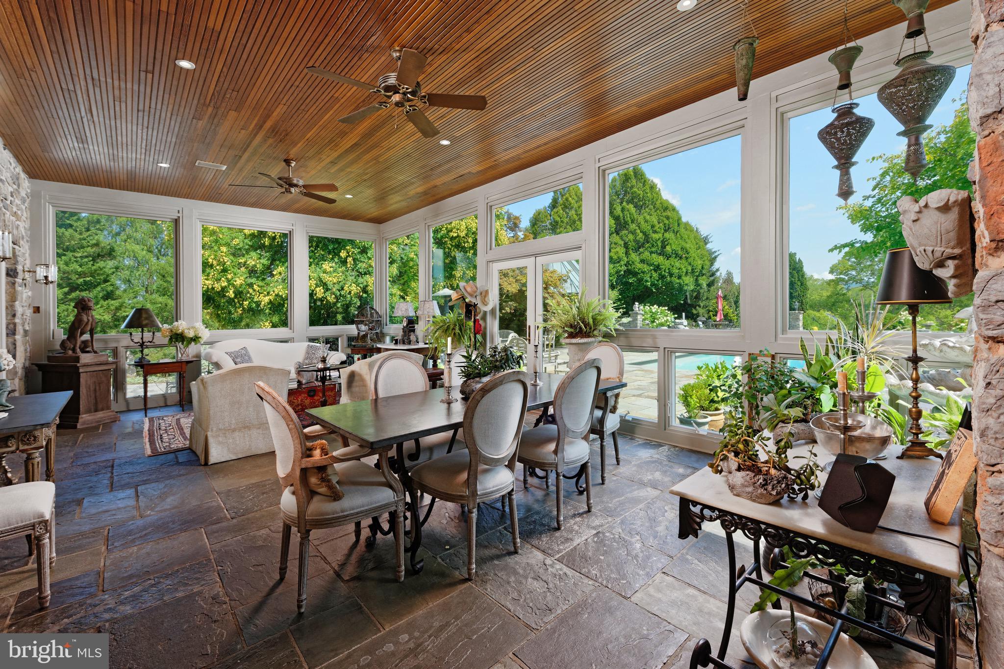 574 Clay Hill Road Boyce, VA 22620 - Photo 9 of 44 a view of a dining room with furniture window and outside view