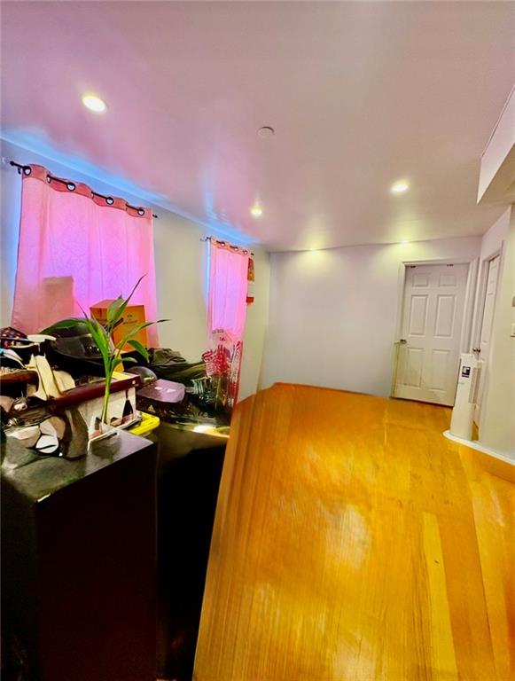 78 Bay 22nd Street, Unit 4 Brooklyn, NY 11214 - Photo 2 of 9 a room with furniture and a potted plant