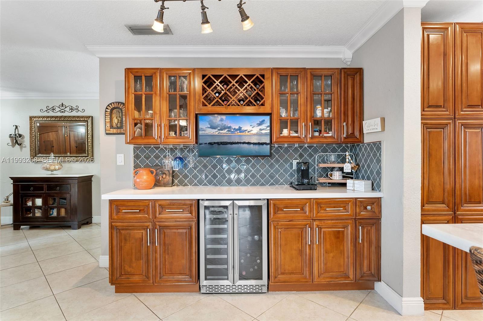 11798 Southwest 32nd Street Miami, FL 33165 - Photo 13 of 31 a kitchen with stainless steel appliances granite countertop a stove and cabinets