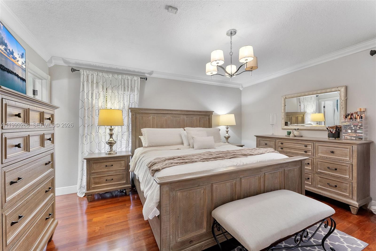 11798 Southwest 32nd Street Miami, FL 33165 - Photo 19 of 31 a bedroom with a bed and a dresser in it