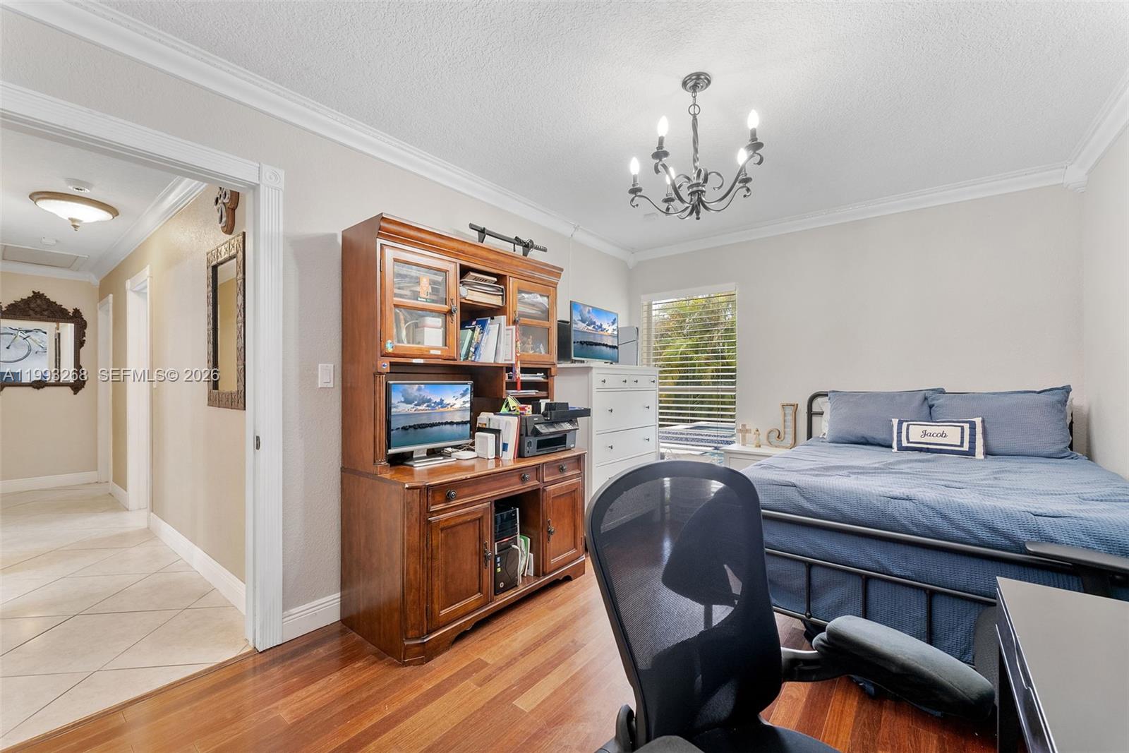 11798 Southwest 32nd Street Miami, FL 33165 - Photo 28 of 31 a view of a dining room with furniture window and wooden floor