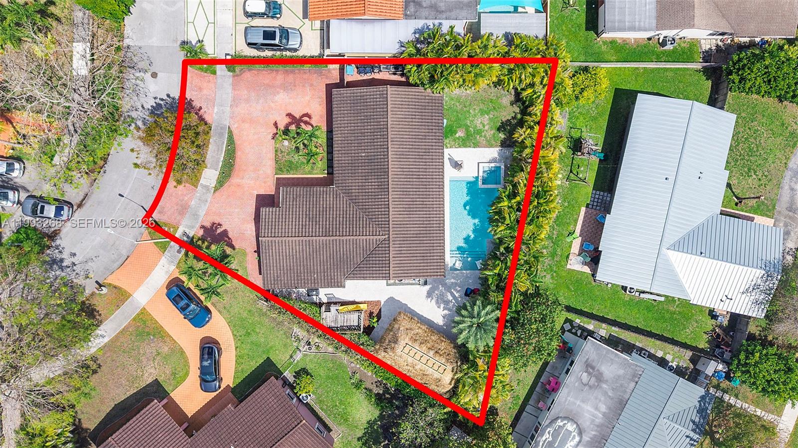 11798 Southwest 32nd Street Miami, FL 33165 - Photo 9 of 31 an aerial view of a house with a yard and outdoor seating