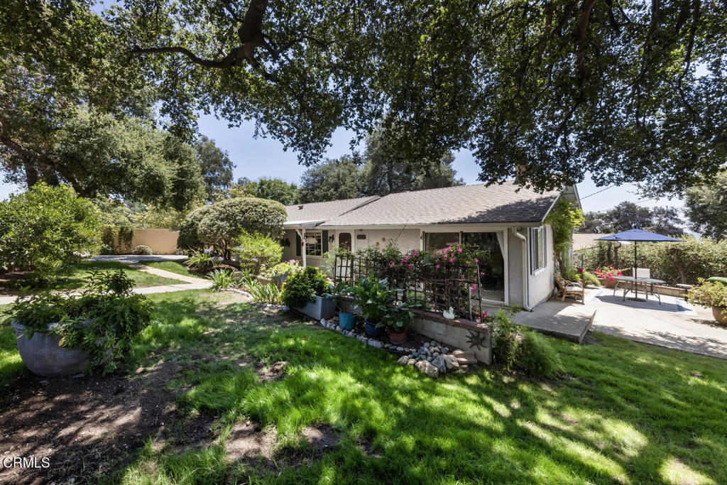 3624 Leilani Way Altadena, CA 91001 - Photo 11 of 18 a view of a patio with table and chairs under an umbrella