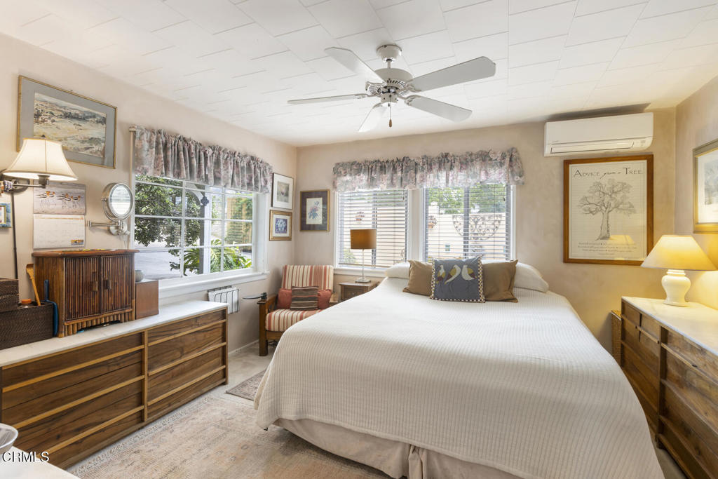 3624 Leilani Way Altadena, CA 91001 - Photo 8 of 18 a bedroom with a large bed and windows