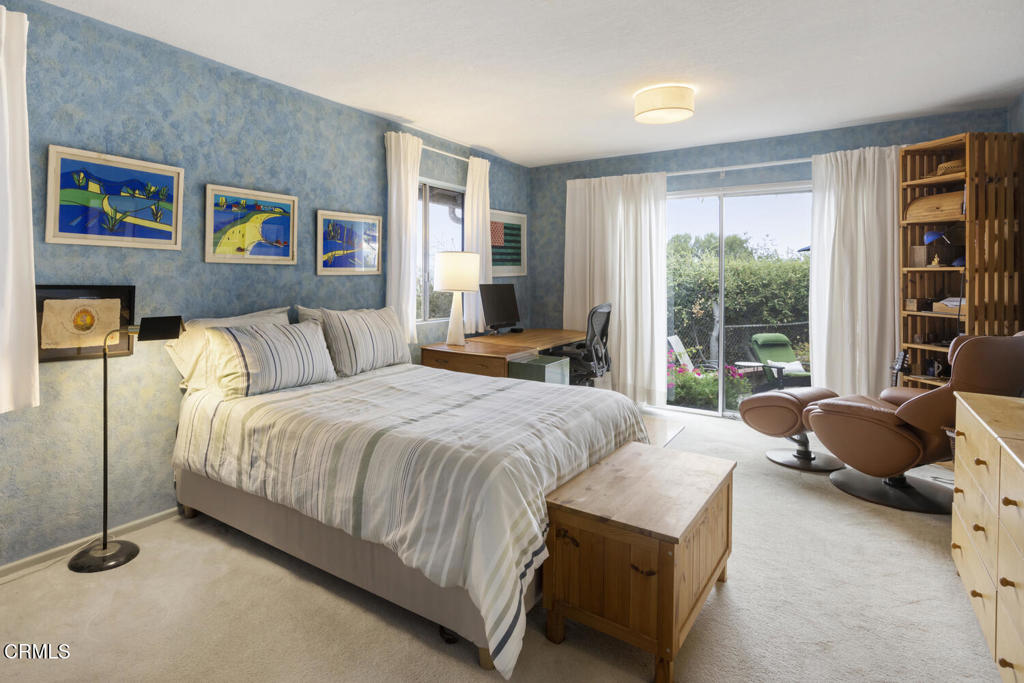 3624 Leilani Way Altadena, CA 91001 - Photo 10 of 18 a bedroom with a bed and glass window