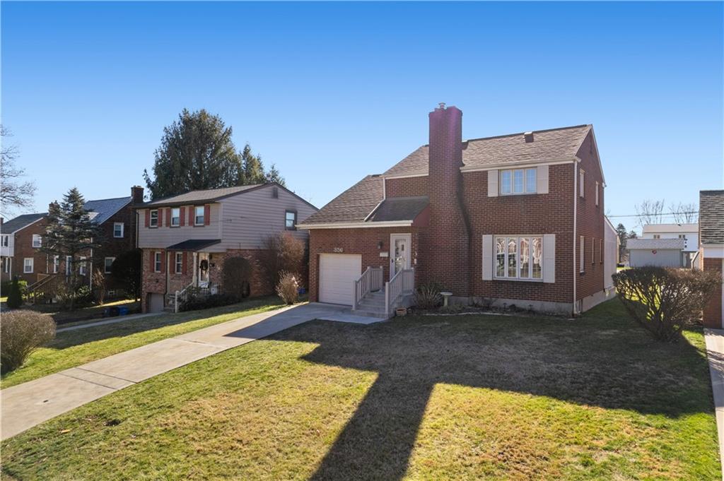 356 Spring Valley Road Pittsburgh, PA 15243 - Photo 2 of 36 a front view of a house with yard