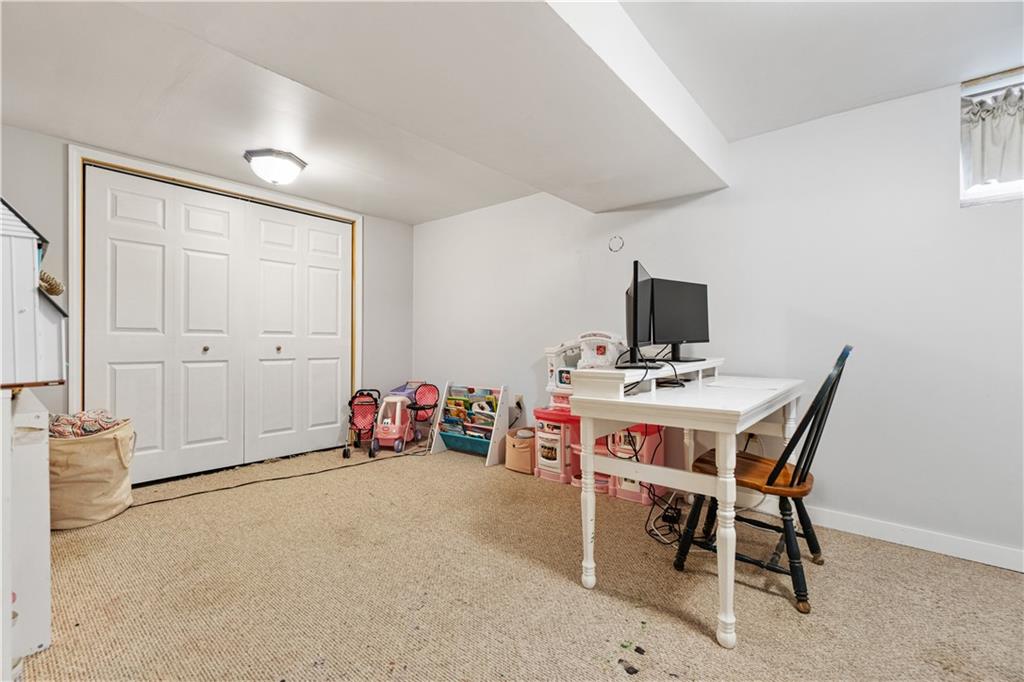 356 Spring Valley Road Pittsburgh, PA 15243 - Photo 27 of 36 a room with a table and chairs