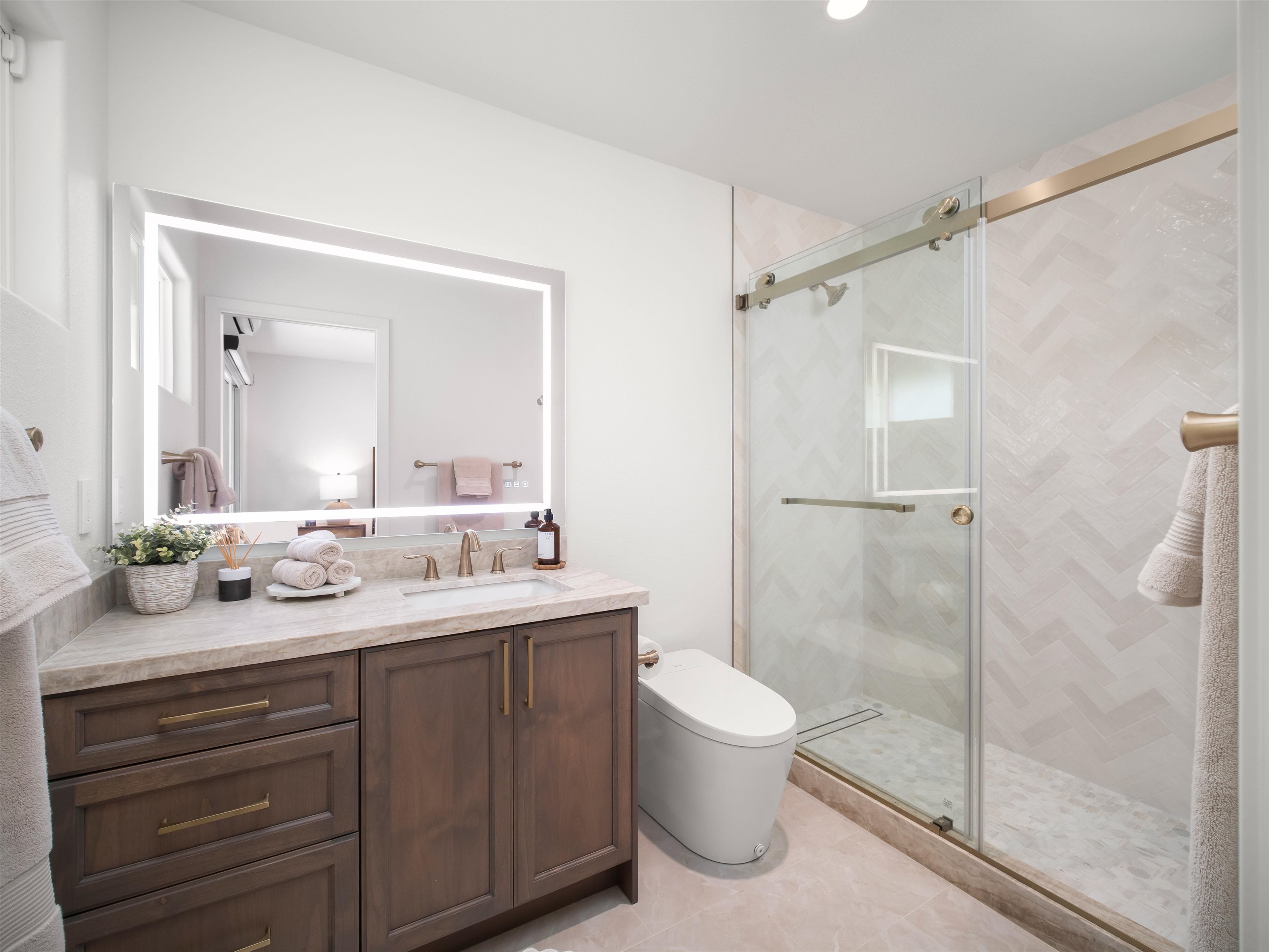 50 Eono Place Haiku, HI 96708 - Photo 20 of 50 a bathroom with a granite countertop sink toilet mirror and shower