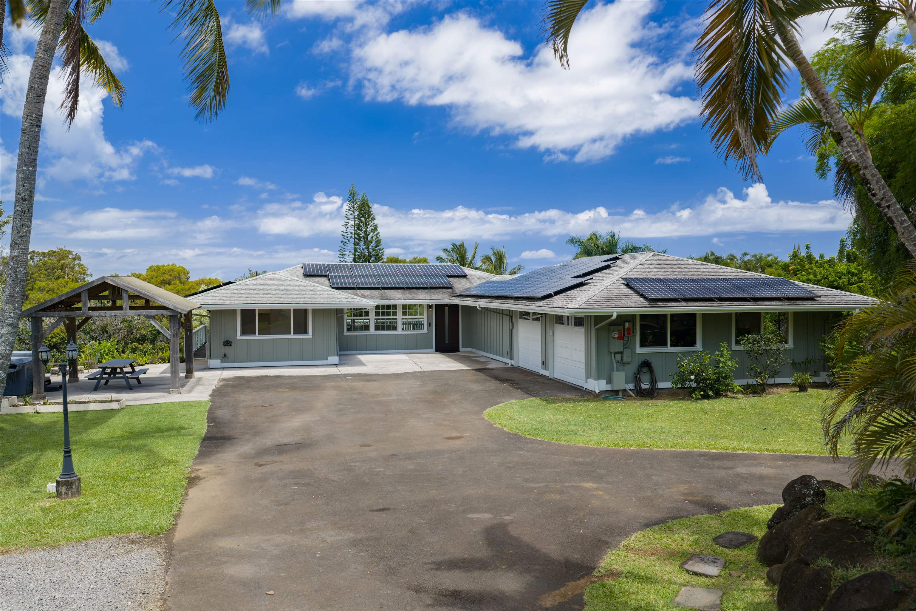 50 Eono Place Haiku, HI 96708 - Photo 46 of 50 a front view of a house with garden