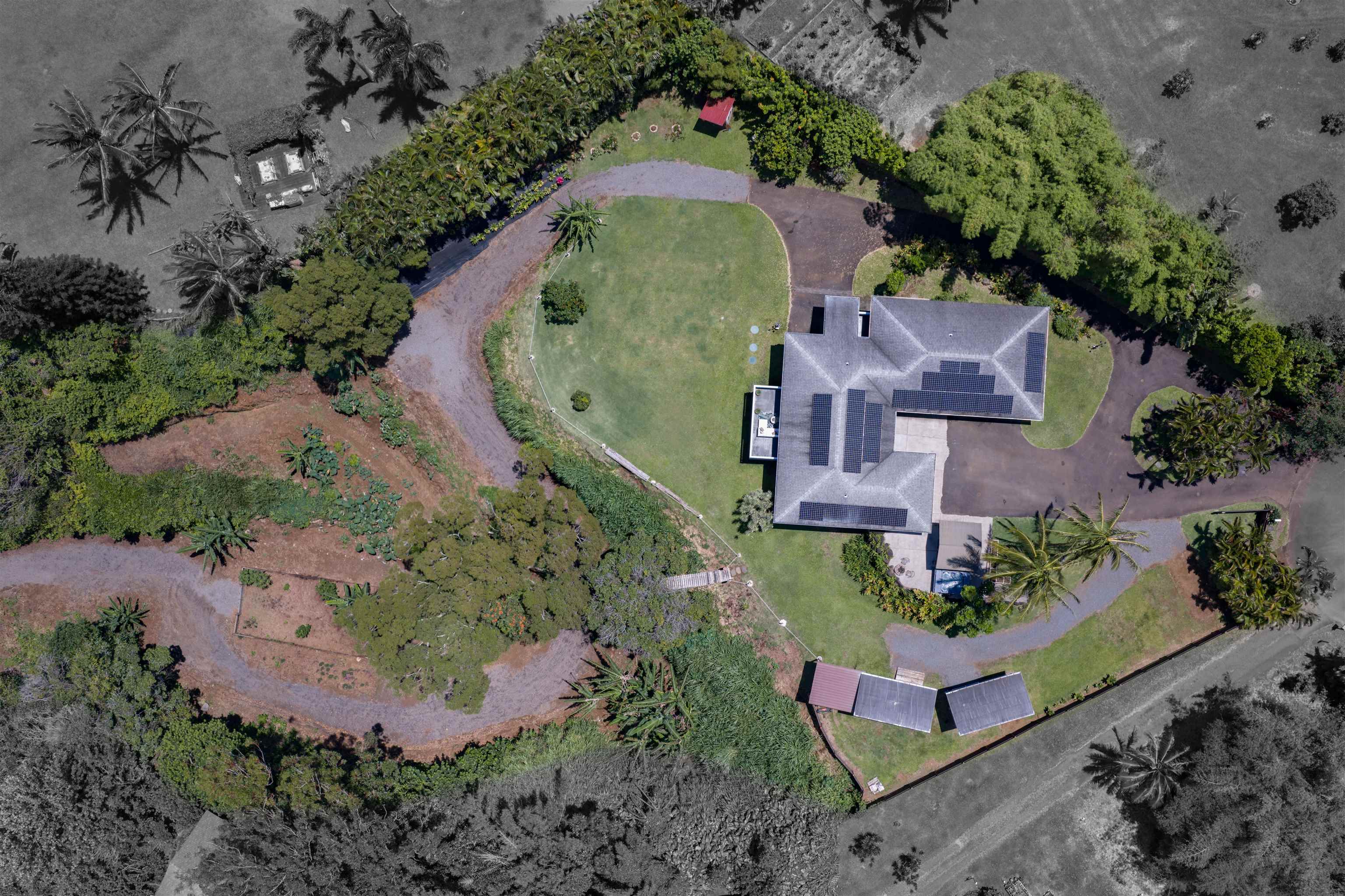50 Eono Place Haiku, HI 96708 - Photo 48 of 50 an aerial view of a house with a garden