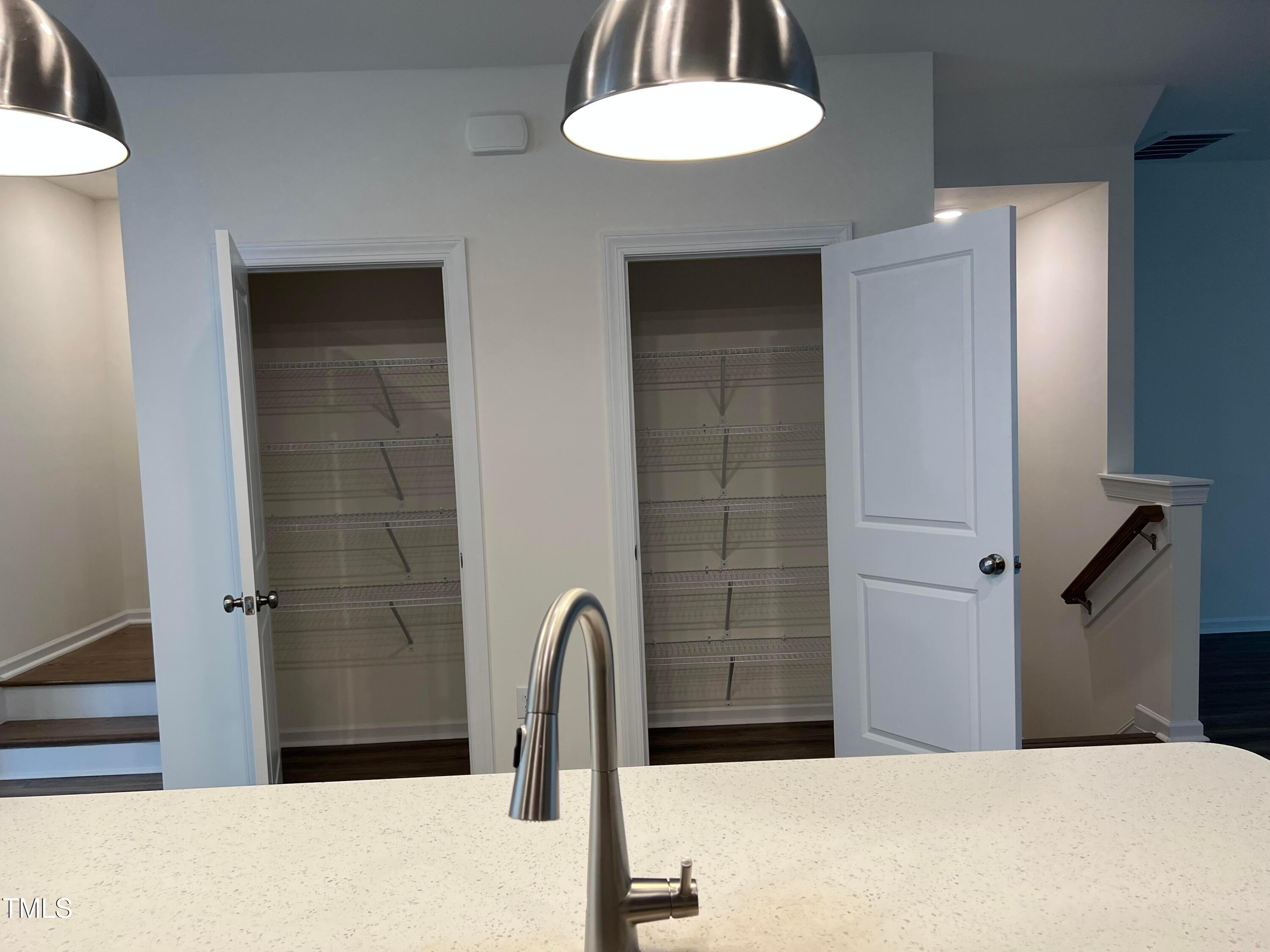 6932 Leesville Road Raleigh, NC 27613 - Photo 13 of 51 a bathroom with a sink a toilet and shower