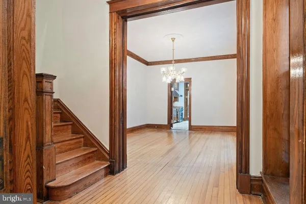 a kitchen with stainless steel appliances granite countertop a stove and a refrigerator