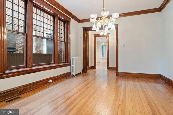 a bathroom with a sink and a large mirror
