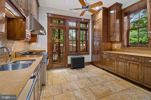a view of gallery with wooden floor