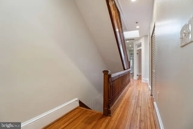 a view of an empty room with a bathroom