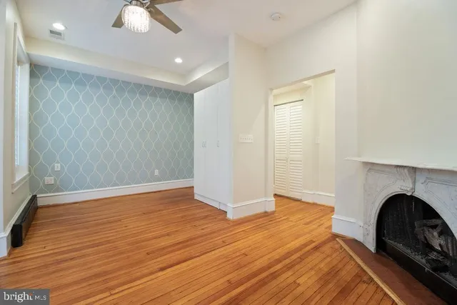 a chairs and a table in a balcony